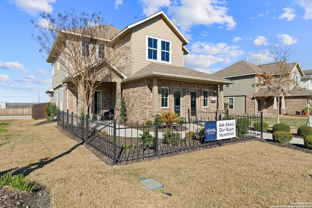 view of front of home with a front lawn