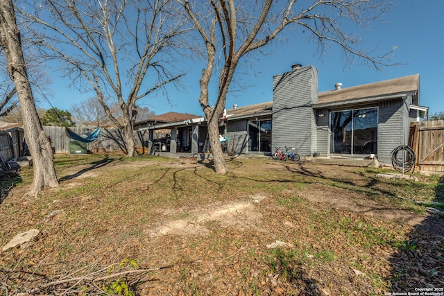 rear view of property with a patio