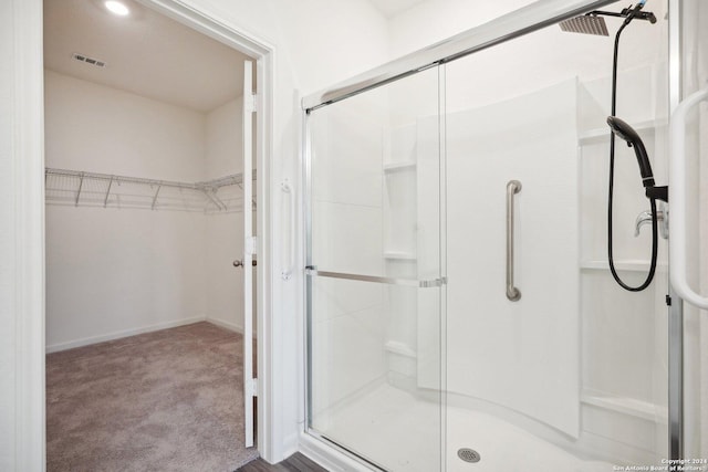 bathroom with walk in shower