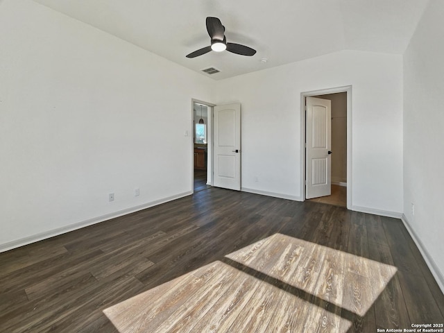 unfurnished bedroom featuring lofted ceiling, ceiling fan, and dark hardwood / wood-style floors