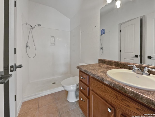 bathroom featuring walk in shower, tile patterned flooring, vaulted ceiling, toilet, and vanity