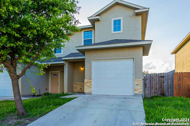 view of property with a garage