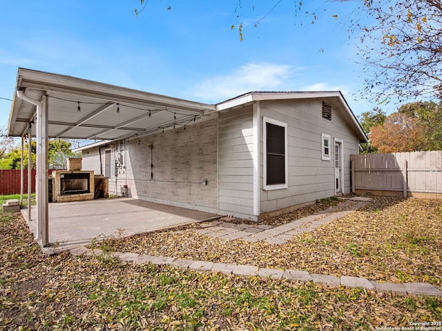 rear view of property with a patio