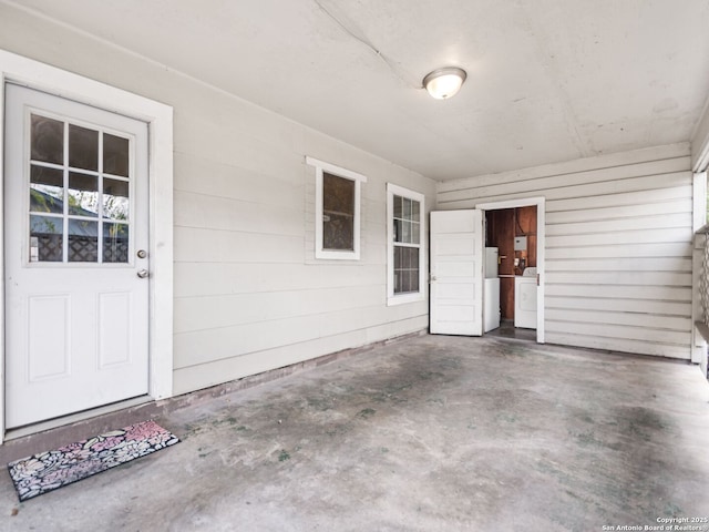 doorway to property with washer / dryer