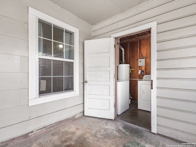 doorway to property featuring separate washer and dryer