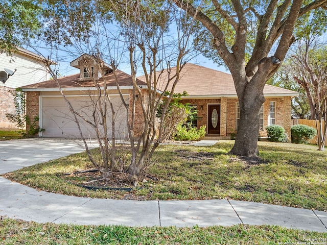 single story home with a front yard and a garage