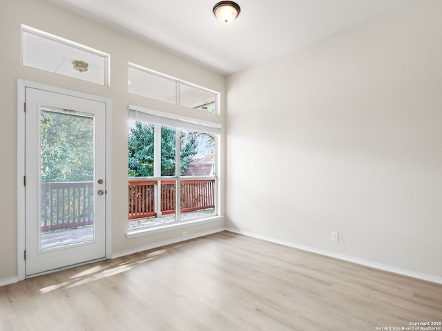 unfurnished room featuring light hardwood / wood-style flooring