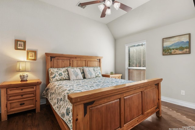 bedroom featuring ceiling fan, dark wood-type flooring, and lofted ceiling