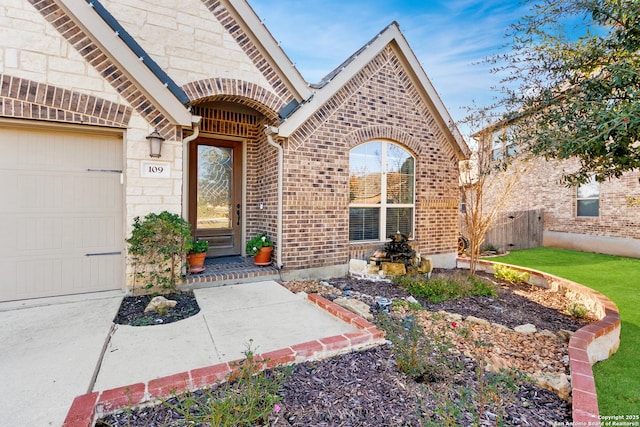 doorway to property featuring a garage