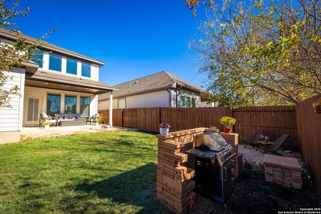 view of yard with a patio and an outdoor hangout area