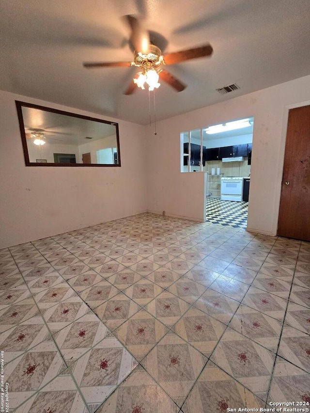 spare room featuring ceiling fan