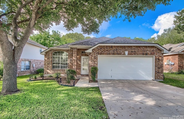 single story home featuring a garage and a front lawn