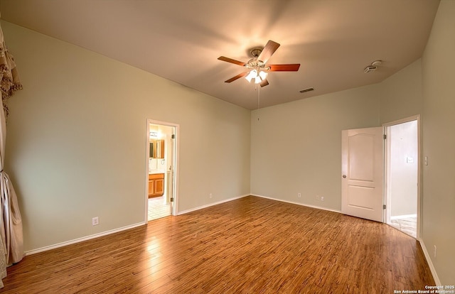 unfurnished room featuring ceiling fan and wood-type flooring