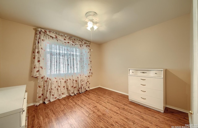 unfurnished bedroom featuring light wood-type flooring