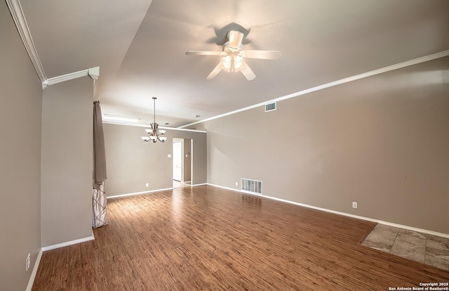 unfurnished living room with crown molding, hardwood / wood-style floors, and ceiling fan with notable chandelier