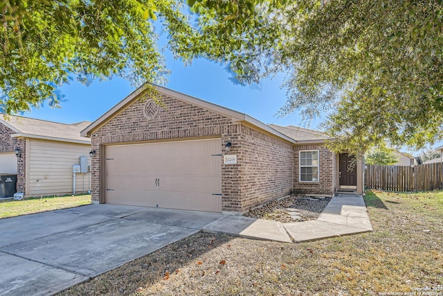 ranch-style house featuring a garage