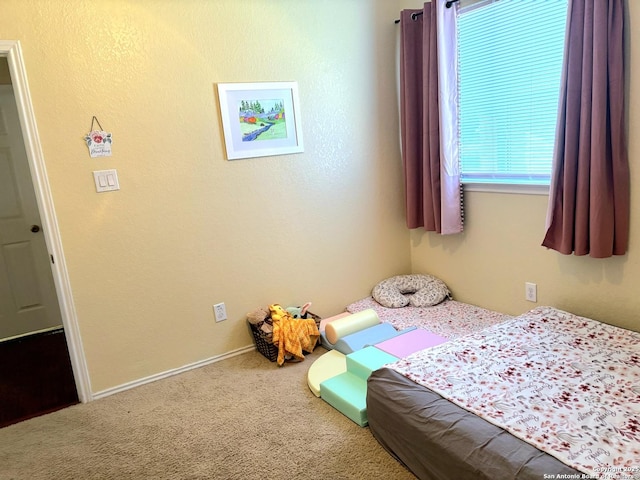 unfurnished bedroom featuring carpet flooring