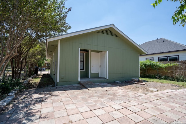 rear view of property featuring a patio