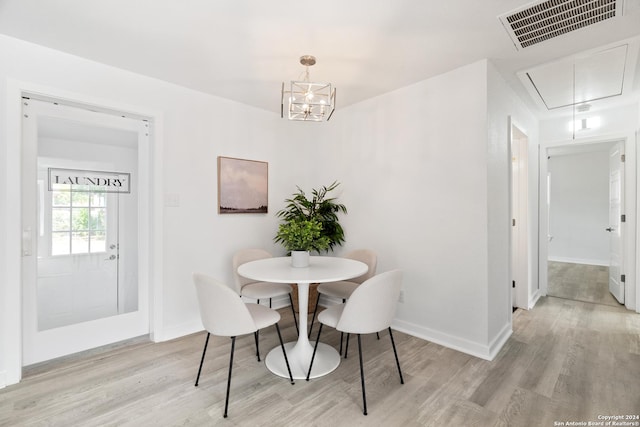 dining area with light wood-type flooring