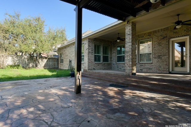 view of patio featuring ceiling fan