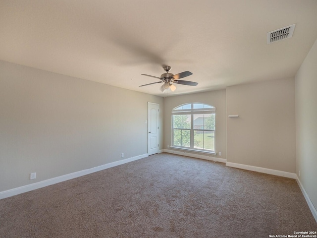 unfurnished room with carpet floors