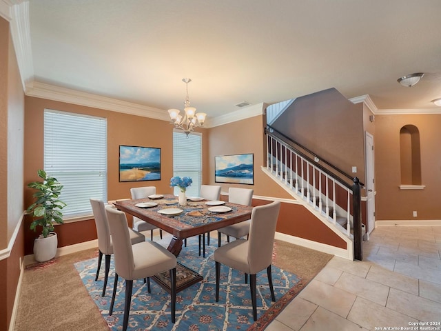 tiled dining room with crown molding and a chandelier