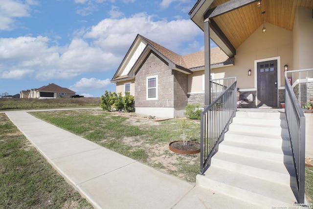 exterior space featuring a front yard