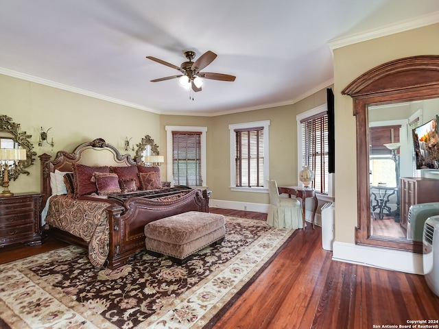 bedroom with ceiling fan, dark hardwood / wood-style floors, and ornamental molding