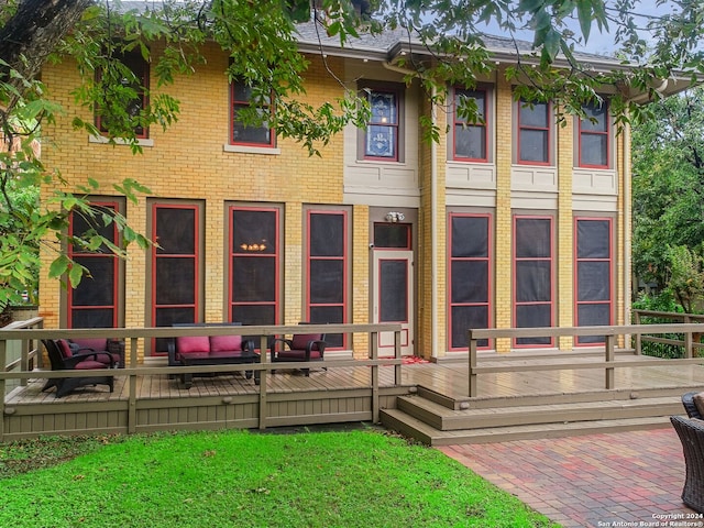 view of front of property with a deck