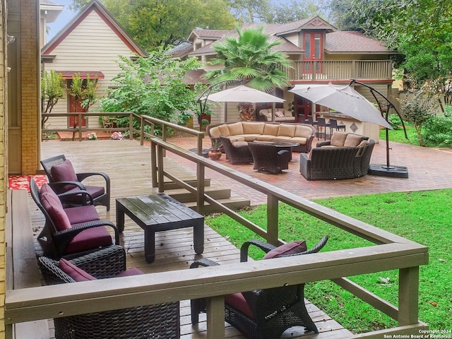 wooden deck with an outdoor living space