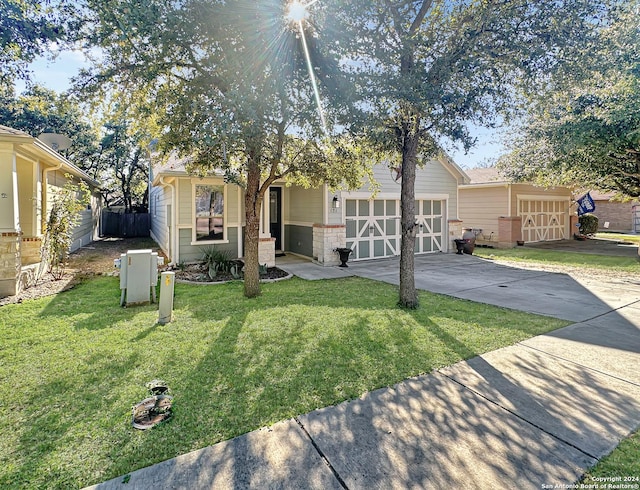 view of front of house with a front lawn and a garage