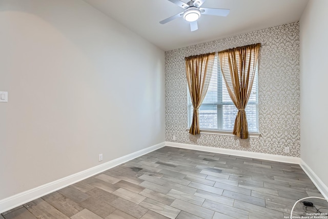 unfurnished room featuring ceiling fan