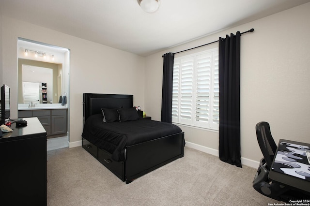 bedroom featuring light colored carpet