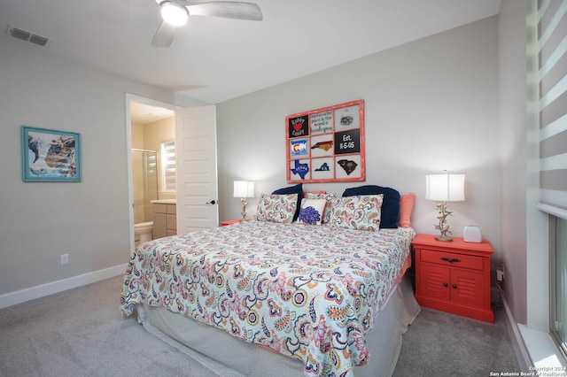 bedroom featuring ensuite bath, ceiling fan, and carpet