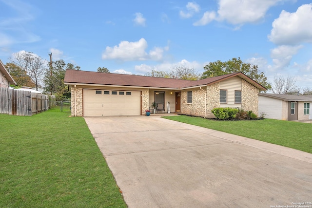 single story home featuring a garage and a front lawn