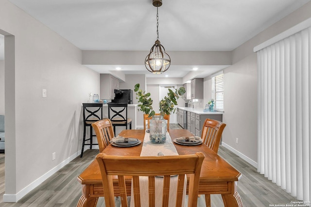 dining space featuring light hardwood / wood-style flooring