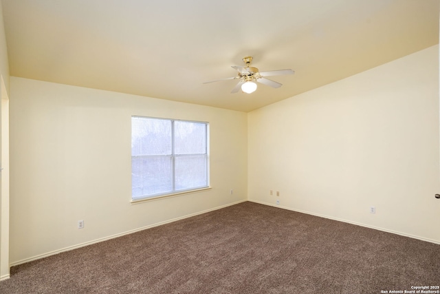 carpeted empty room featuring ceiling fan