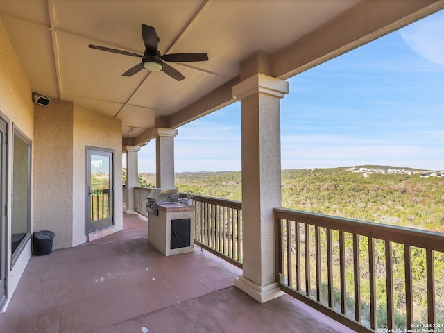 view of patio / terrace featuring ceiling fan