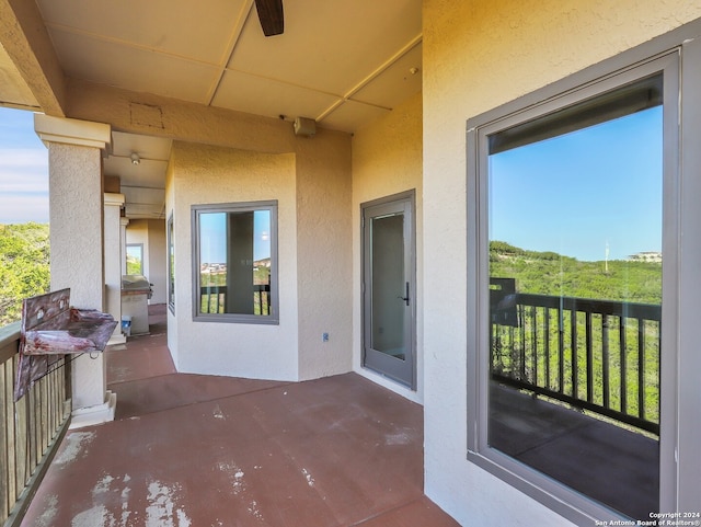 view of patio featuring ceiling fan