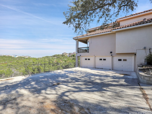 view of home's exterior with a garage