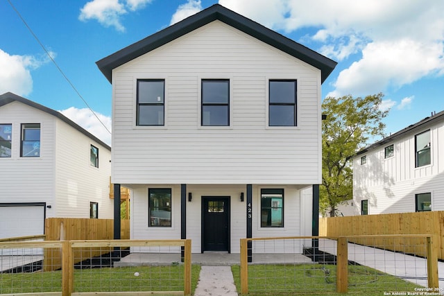 view of front of home with a front lawn and a porch