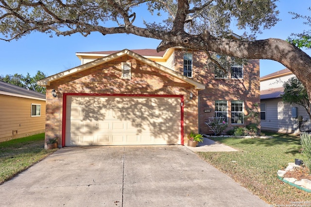 view of front of home featuring a garage and a front lawn