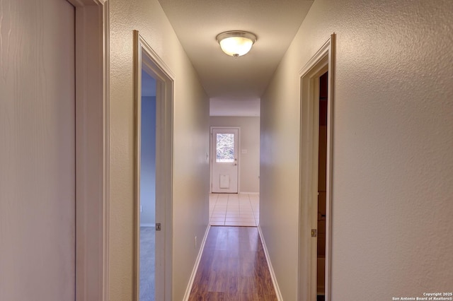 hall featuring dark wood-type flooring