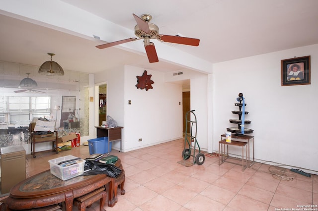 interior space featuring ceiling fan