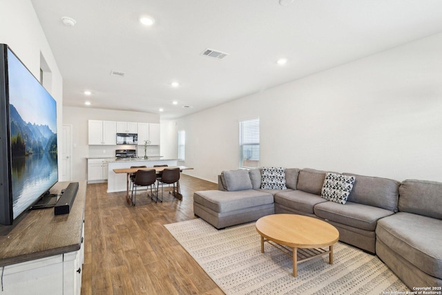 living room featuring light hardwood / wood-style floors