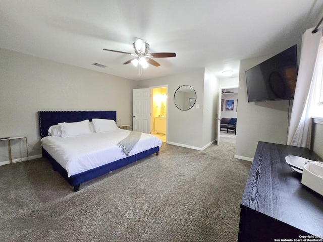 carpeted bedroom featuring ensuite bath and ceiling fan