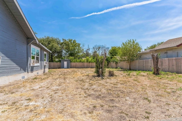 view of yard with a storage shed