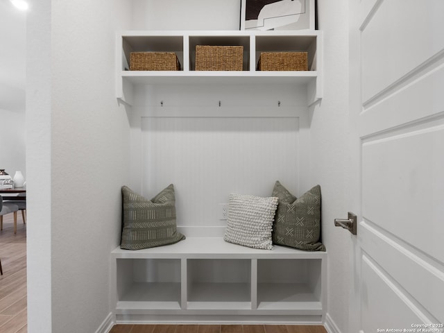 mudroom with hardwood / wood-style floors