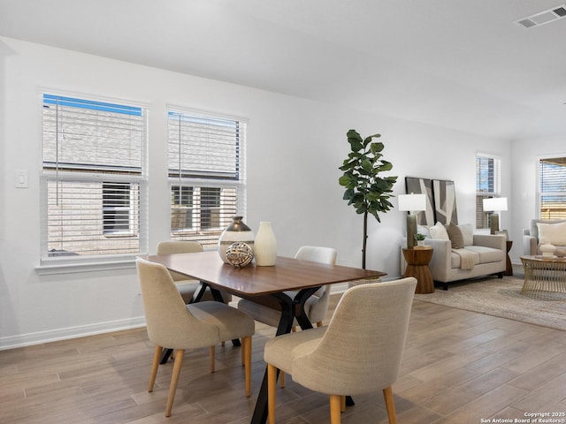 dining area featuring light hardwood / wood-style flooring