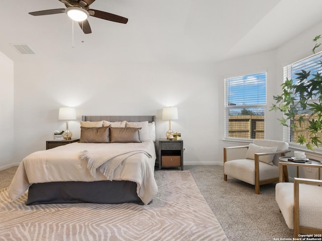 bedroom featuring ceiling fan and light colored carpet